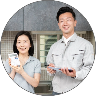 修理スタッフとお客様の写真